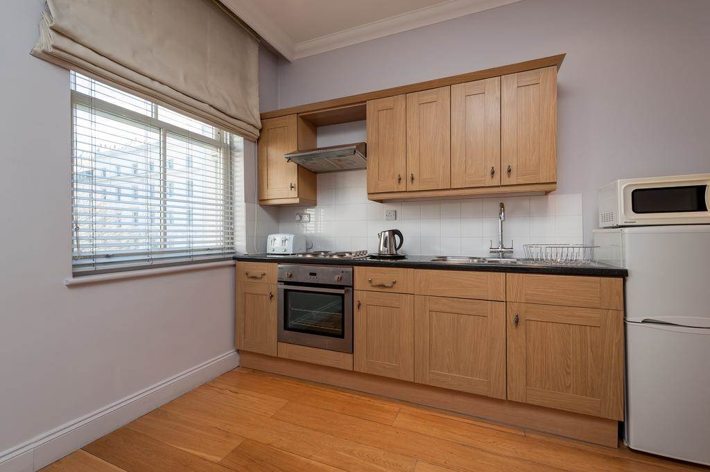 Standard Apartment in Paddington 12-london-street-apartments-kitchen.jpg